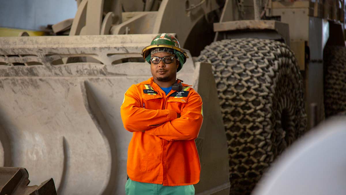 Employee in Front of Payloader